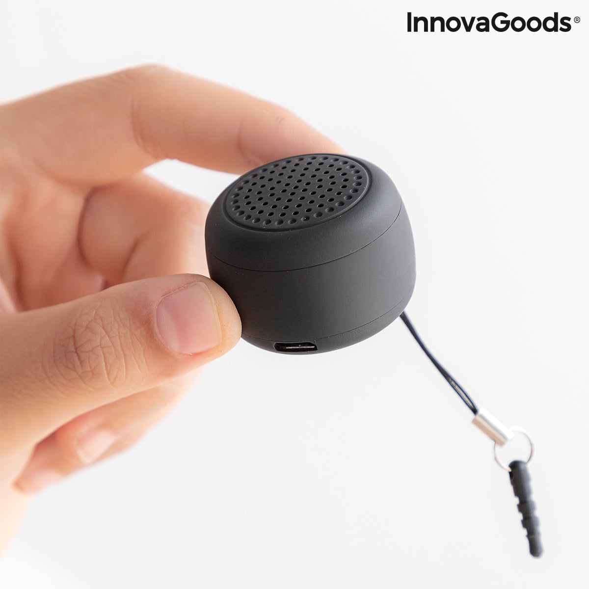 Rechargeable portable wireless mini speaker by Miund InnovaGoods, compact consumer electronics with control buttons and LED indicator.