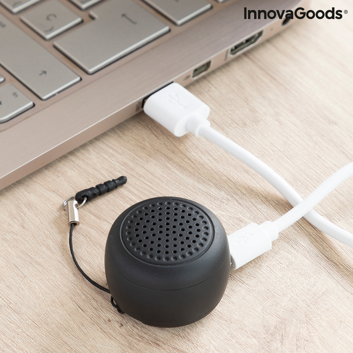 Rechargeable portable wireless mini speaker by Miund InnovaGoods, showing compact design with control buttons and speaker grille.