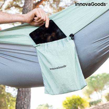 Rewong InnovaGoods double camping hammock by Bigbuy, shown hanging outdoors with fabric and support ropes.