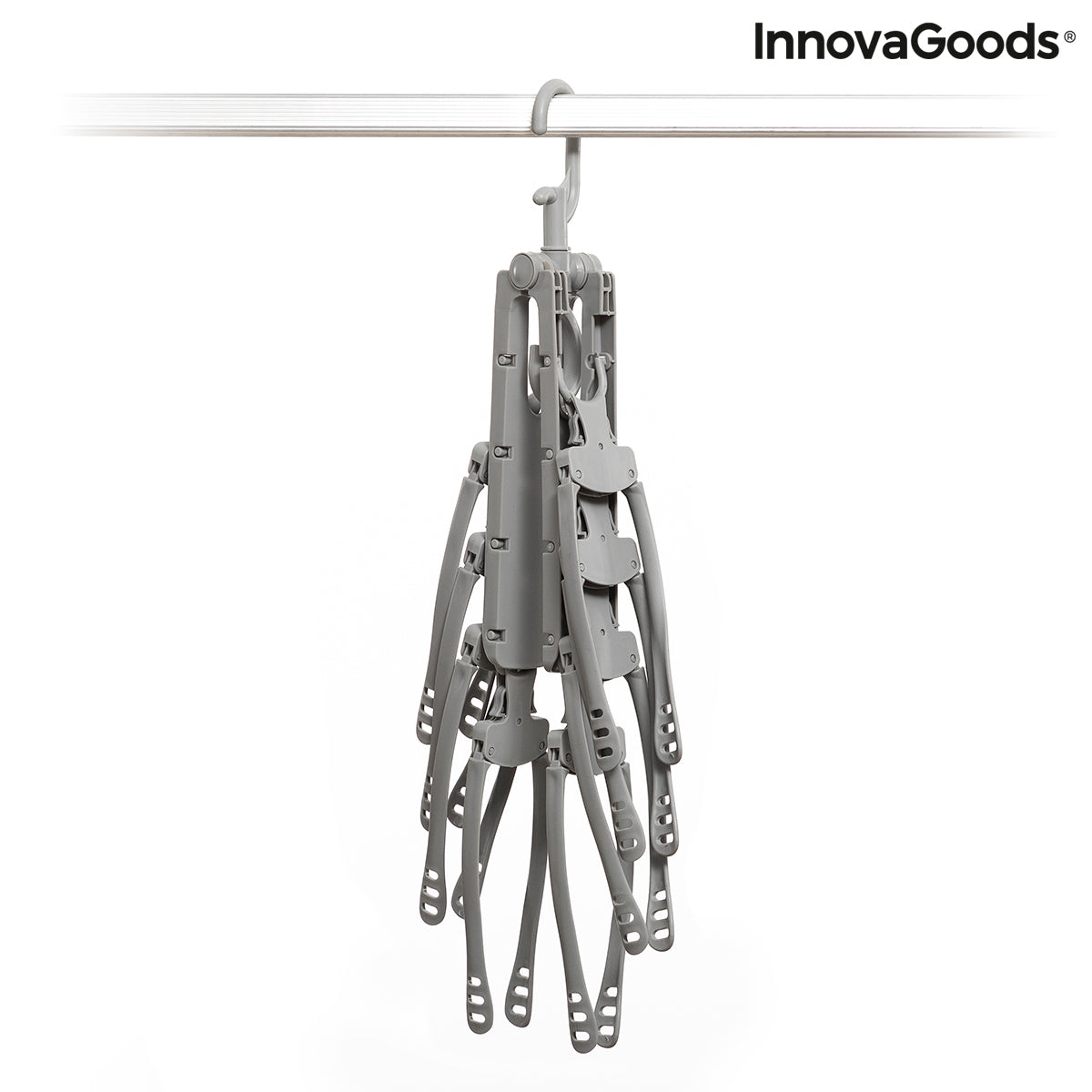 InnovaGoods 8-in-1 Multi Hanger Spavver for organizing clothes and accessories, mounted on a wall in a modern room.