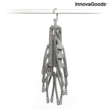 InnovaGoods 8-in-1 Multi Hanger Spavver for organizing clothes and accessories, mounted on a wall in a modern room.