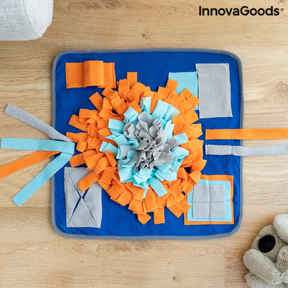 Sniffing mat for pets by Fooland InnovaGoods, featuring colorful fabric and multiple scent pockets for stimulating play.