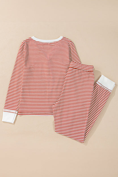 Byzantium Bay Christmas stripe lounge set with matching top and pants, featuring festive red and white holiday patterns.
