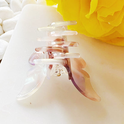 Fuchsia Hercules butterfly hair claw jewelry accessory with a detailed butterfly design and metallic finish.