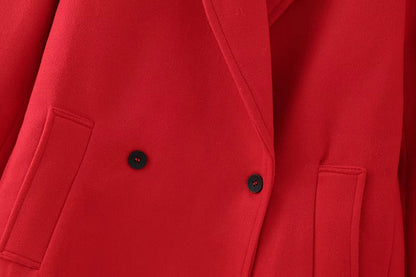 Red double-breasted long overcoat from Carmine Juneberry Haute Edition 25, stylish jacket with tailored fit and classic design.
