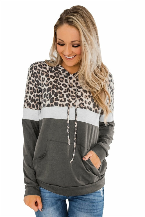 Jade Into the Jungle color block hoodie for women featuring vibrant jungle-inspired design and comfortable casual fit.