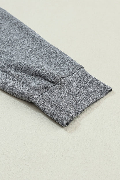 Gray Carmine Juneberry joggers with drawstring waist and front pockets, casual and comfortable for everyday wear.