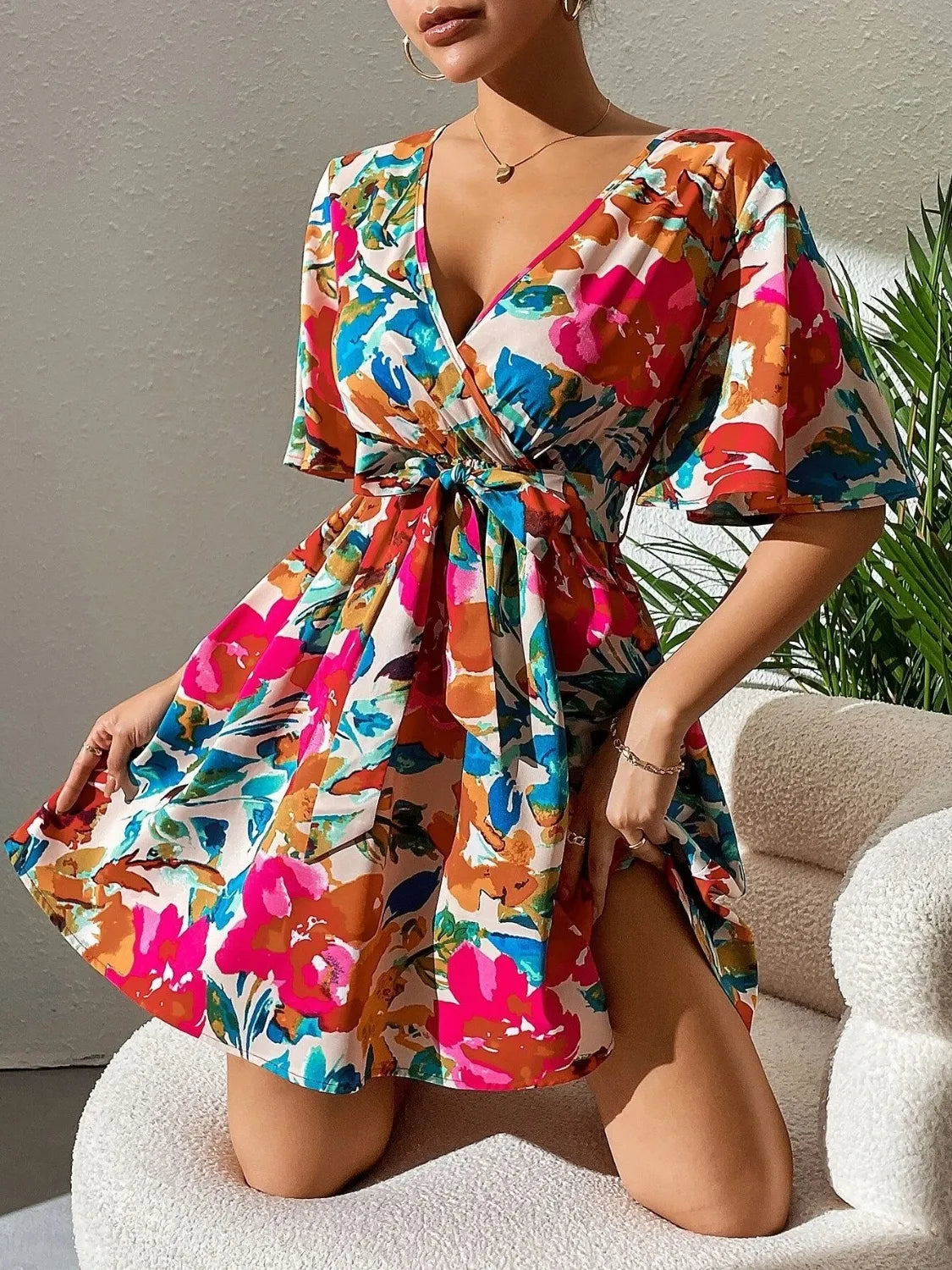 Printed surplice short sleeve mini dress for women by Ruby Styx, featuring a stylish and comfortable design.