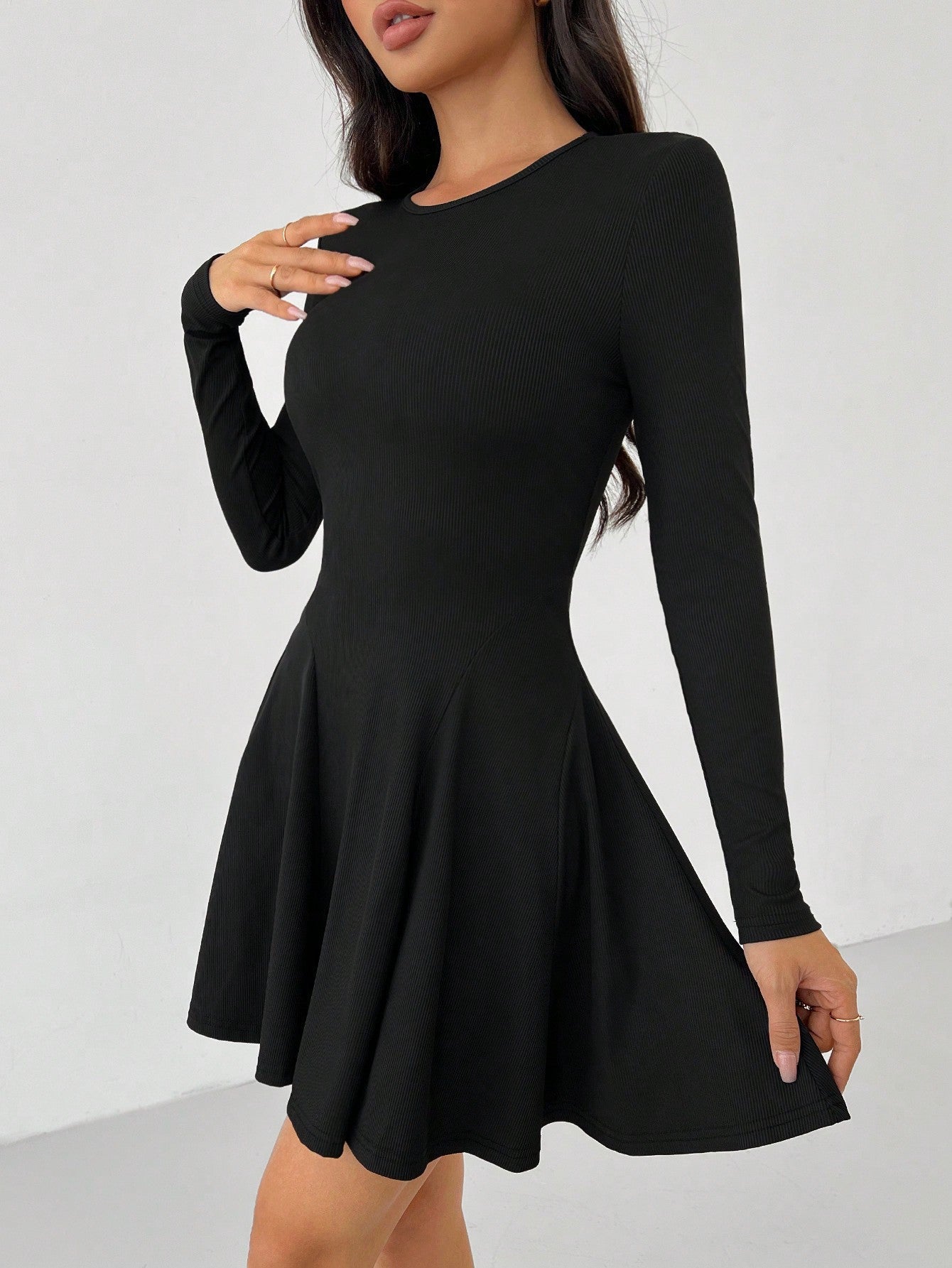 Green Alcestis dress featuring a flowy silhouette, sleeveless design, and elegant fabric perfect for casual or formal occasions.