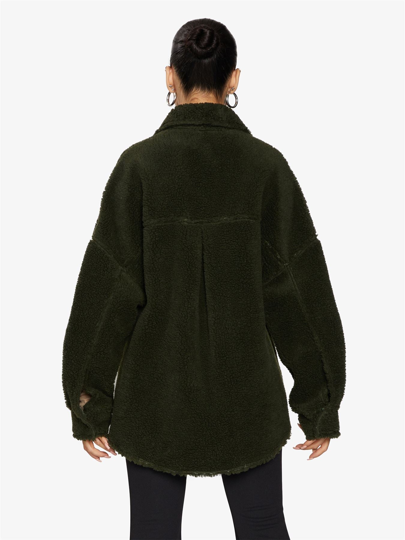 Rose Eleusis oversized patch pocket borg teddy shacket with a cozy, plush fleece exterior and large patch pockets for a casual, stylish look.