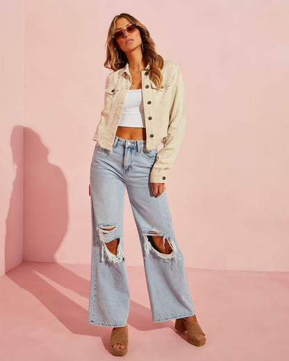 Carmine Juneberry ripped slimming jeans for women showcasing distressed details and slim fit design on model.