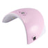 Teal Simba automatic sensing 36W LED nail polish dryer lamp with sleek design for quick, efficient nail curing in the bath and beauty routine.