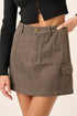 Jade Icarus Mittoshop cargo mini skirt with side pockets, stylish automotive-inspired design, in dark fabric.