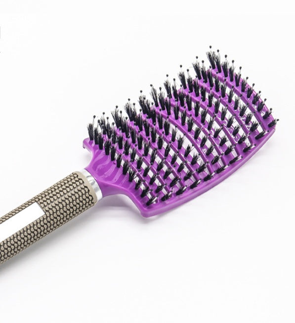 CJDropshipping anti-knot hairbrush for women, detangling brush with bristles, designed for smooth, tangle-free hair styling.