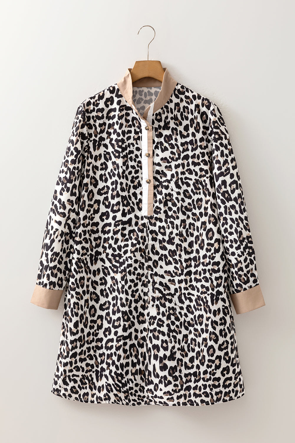 Leopard stripe collared long sleeve flared dress by Byzantium Bay, featuring a stylish pattern and flowing silhouette.
