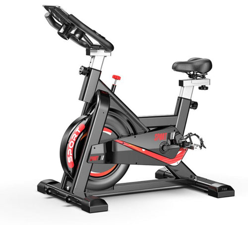 Indoor spinning bike from Puce Orpheus with monitor displaying workout stats, designed for indoor cardio exercise.