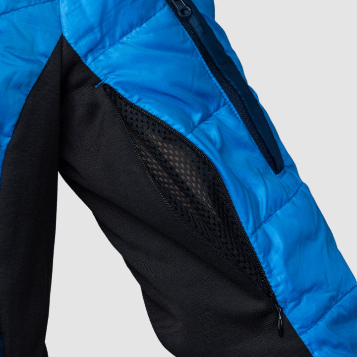 Women’s blue EcoDown jacket by Rose Hemera, activewear outerwear with a warm, lightweight insulated design for outdoor activities.