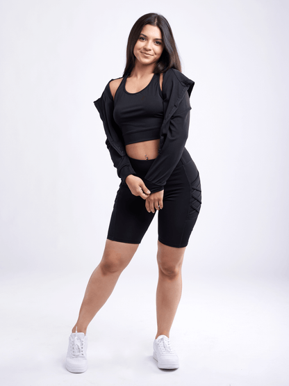 Black Lavender JupiterGear athletic zip-up crop hoodie jacket, activewear with a fitted design and front zipper, shown on a model.