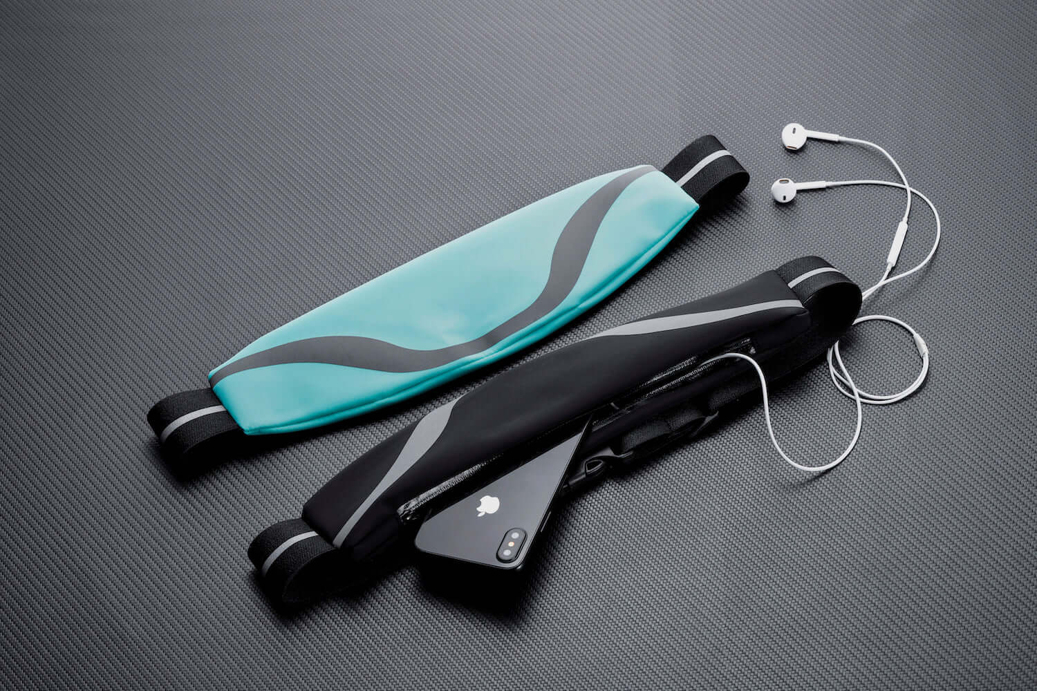 Black Lavender water-resistant sport waist pack with reflective strip, ideal for running and outdoor activities, compact and secure fit.