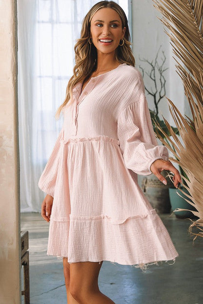 Women’s crinkle distressed puff sleeve flared dress by Jade Icarus, featuring a textured fabric and flowy silhouette.