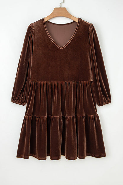 Velvet V-neck long sleeve tiered mini dress for women by Byzantium Bay, featuring a stylish and elegant design.