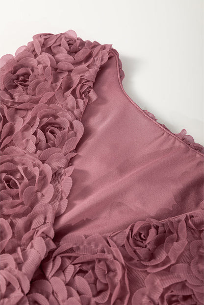 Floral textured V-neck sleeveless bodysuit by Byzantium Bay, wrapped design with a fitted silhouette and vibrant floral pattern.