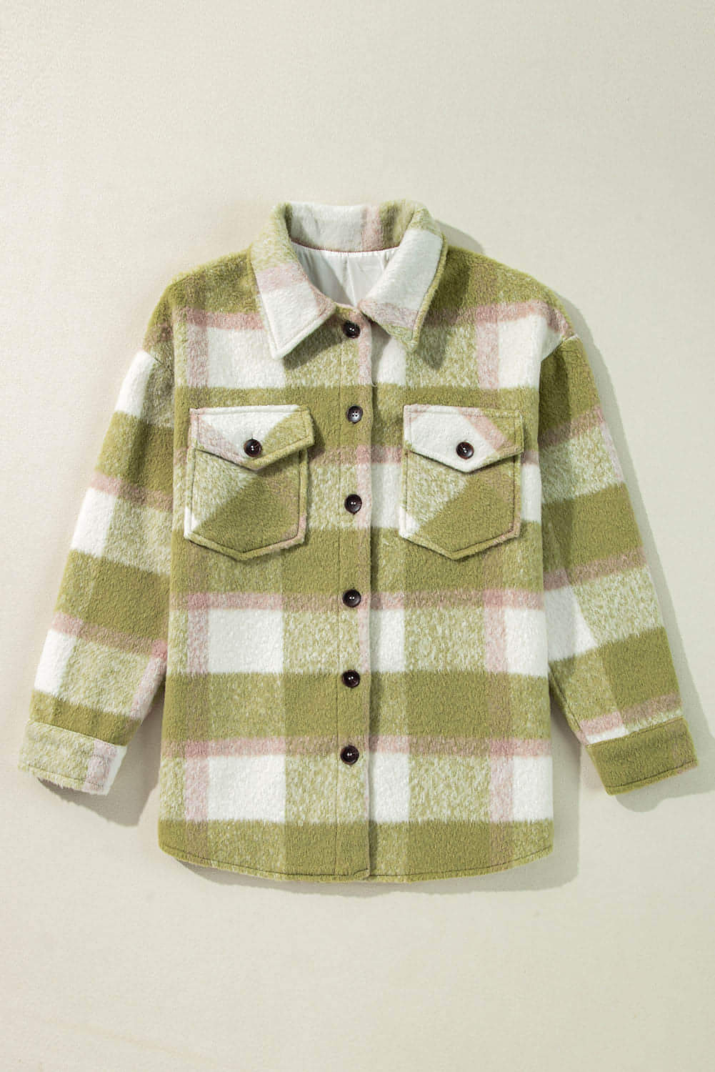Sage green plaid print Carmine Juneberry shacket with buttoned flap pockets, relaxed fit, perfect for casual tops and blouses.