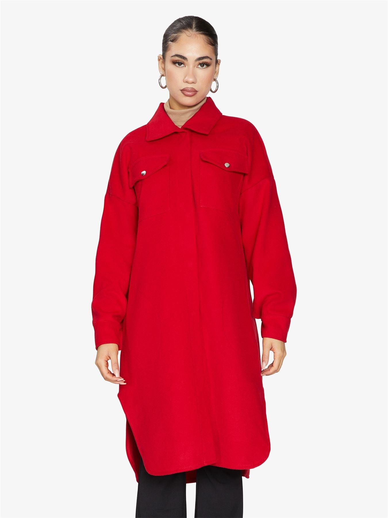 Rose Eleusis oversized longline shacket in neutral fabric, featuring a relaxed fit and button details, suitable for casual wear.