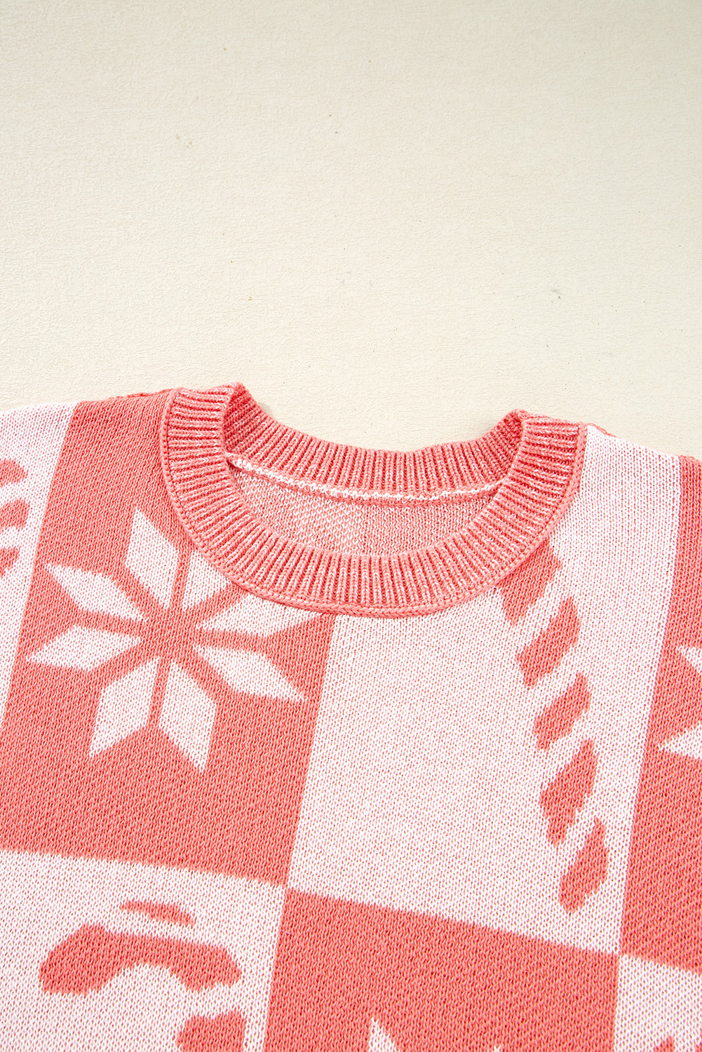 Byzantium Bay Christmas candycane snowflake checker sweater featuring festive red, white, and green pattern on cozy knit fabric.