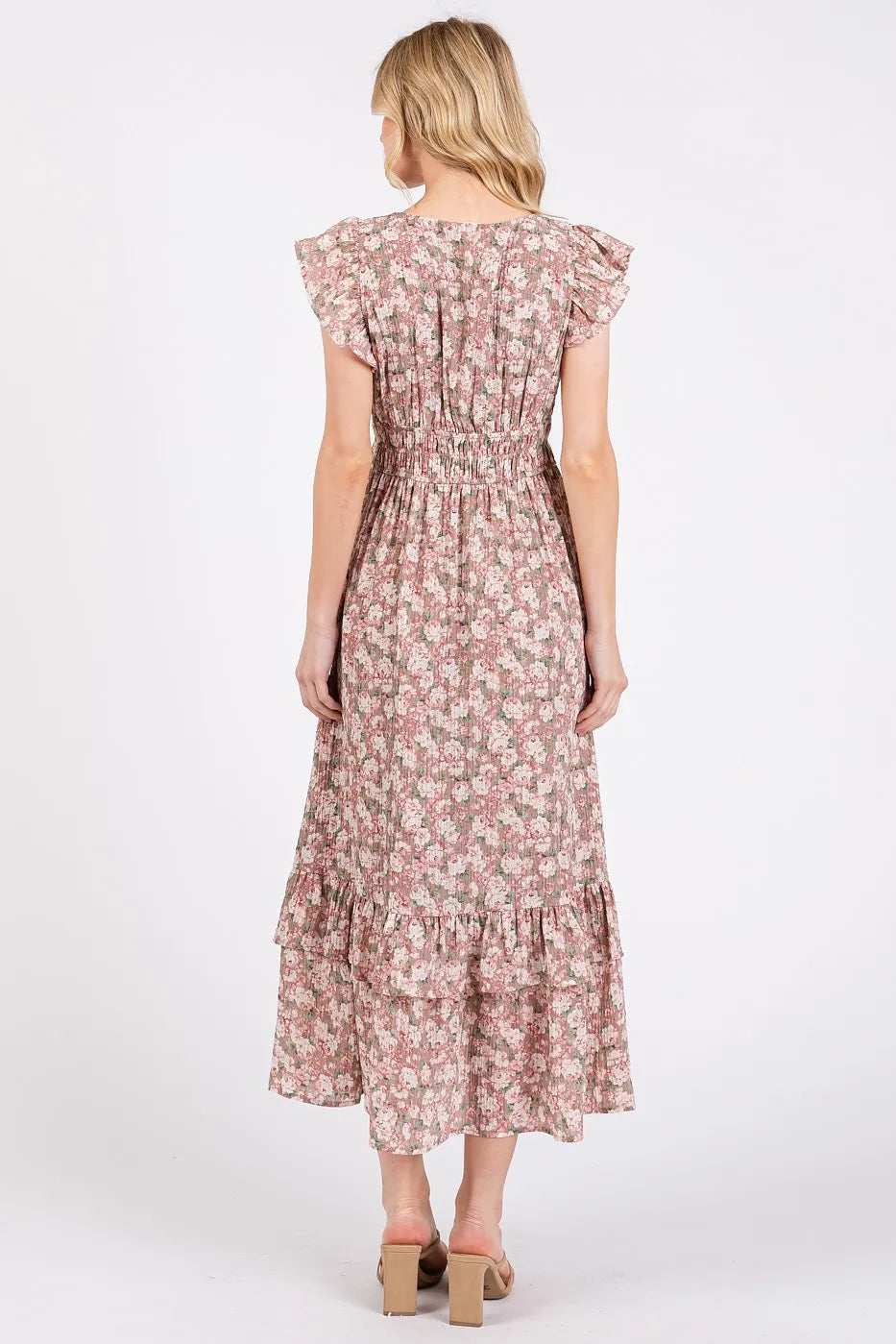 Automotive image showing a Jade Icarus Mittoshop flower print ruffle cap sleeve V-neck midi dress with floral pattern and ruffle details.