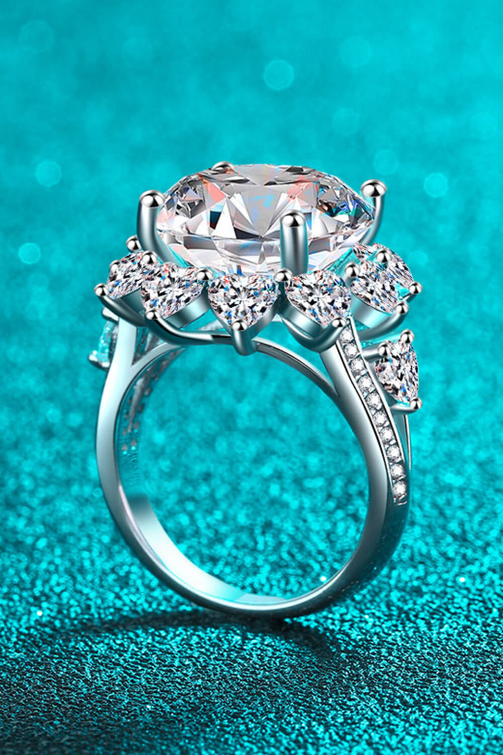 Pear Daisy 10 carat moissanite flower-shaped ring with intricate petal design, perfect for elegant jewelry collection.