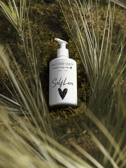 Pink Lucky Self-Love Bliss moisturizing body lotion bottle with a soft pink label, designed for nourishing body care.