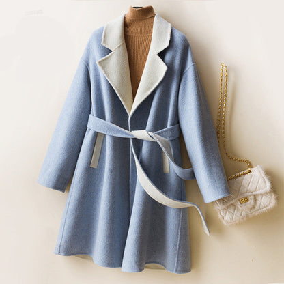 Ladies wool double-faced coat by Carmine Juneberry, showcasing classic style and cozy warmth in a tailored jacket.