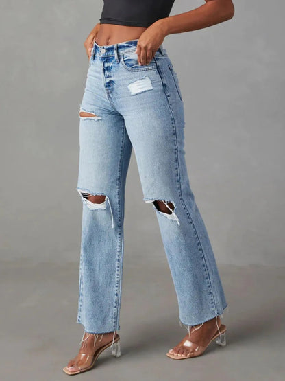 Pear Daisy distressed straight leg jeans with pockets, featuring a casual, worn-in denim look and classic five-pocket design.