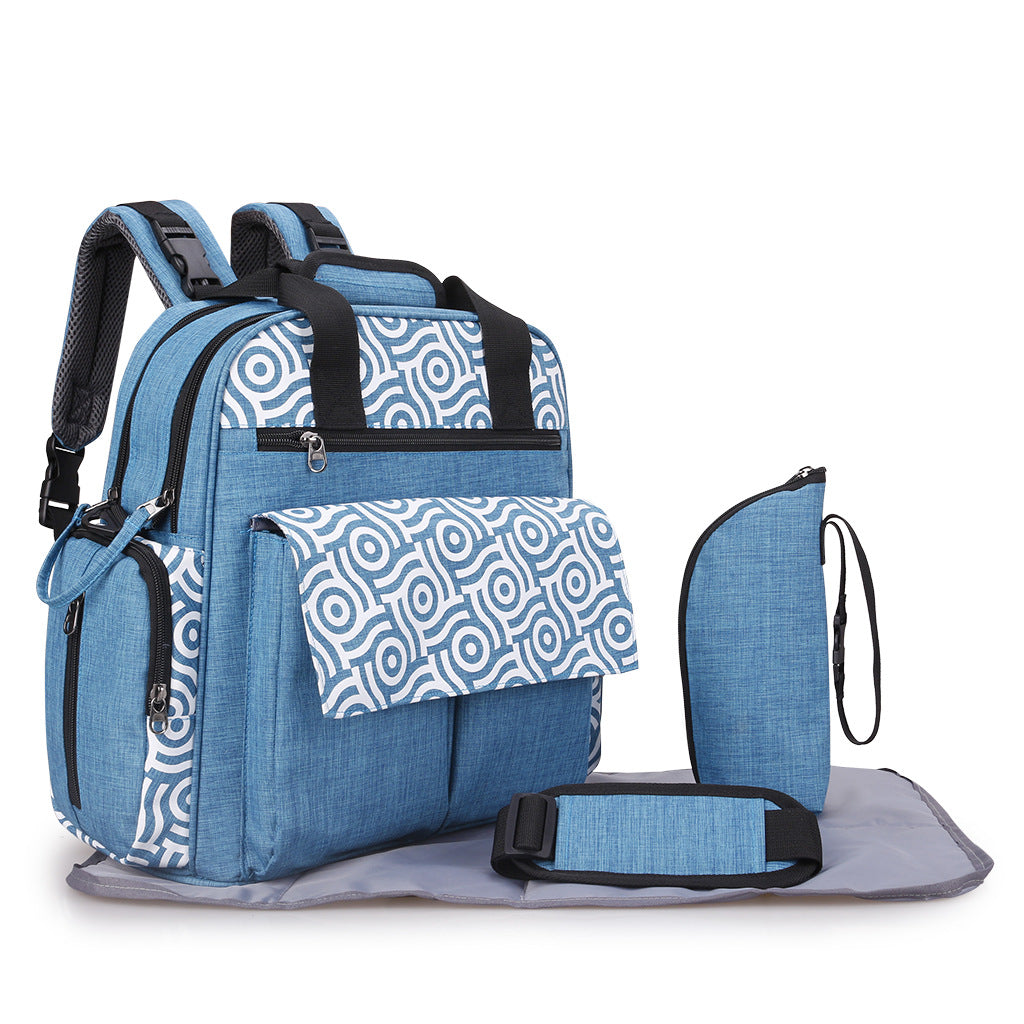 Maroon Asteria large capacity multi-function mommy bag with multiple compartments and adjustable straps, designed for practical use.