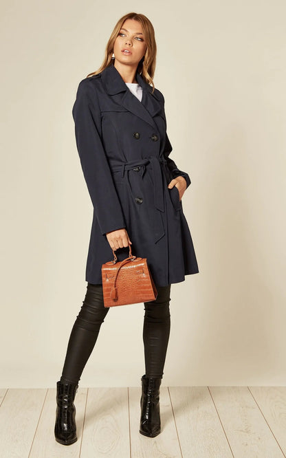 Navy spring/summer military-style double-breasted trench coat by Rose Eleusis, lightweight jacket with button details.