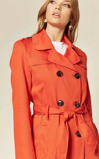 Rose Eleusis military double-breasted trench coat in spring/summer style, shown on a model with a classic design and lightweight fabric.