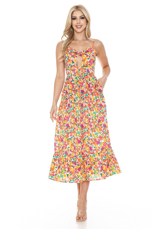 Women’s floral maxi dress by Jade Icarus featuring a flowing silhouette and vibrant flower print, perfect for summer wear.