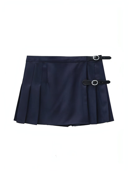 Carmine Juneberry pleated skirt with flowy fabric and midi length, displayed on a neutral background.