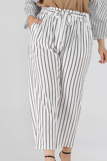 Pear Daisy striped paperbag waist cropped pants, stylish home and garden decor with a modern, striped fabric design.
