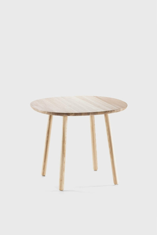 Naïve dining table by Aquamarine Poppy, natural wood finish, rectangular tabletop with sturdy legs, modern furniture design