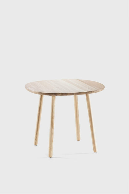 Naïve dining table by Aquamarine Poppy, natural wood finish, rectangular tabletop with sturdy legs, modern furniture design