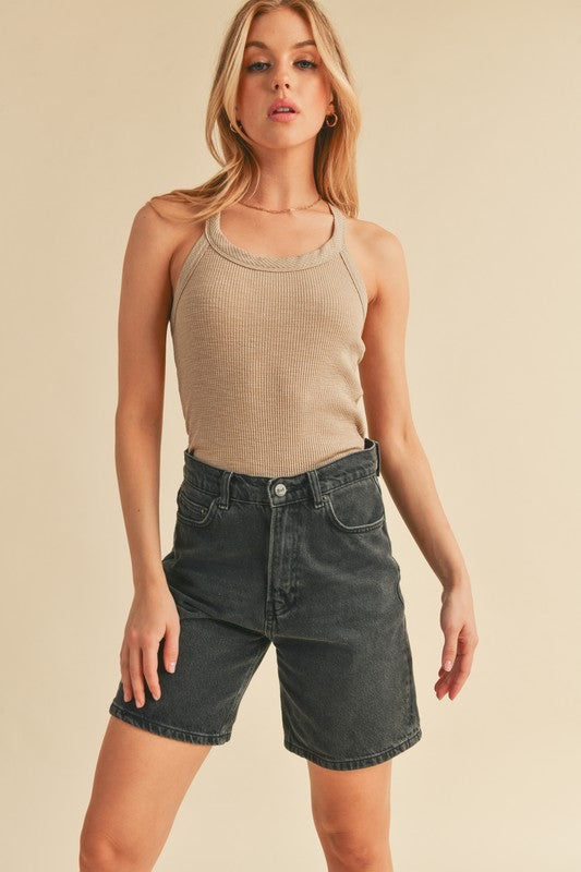 Jade Icarus Aemi + Co scoop neck ribbed tank in automotive style, shown in a close-up image highlighting the ribbed fabric and neckline.