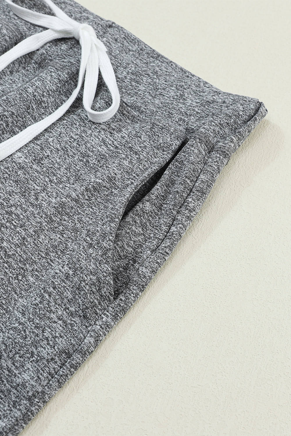 Gray Carmine Juneberry joggers with drawstring waist and side pockets, casual athletic style, suitable for gifts.