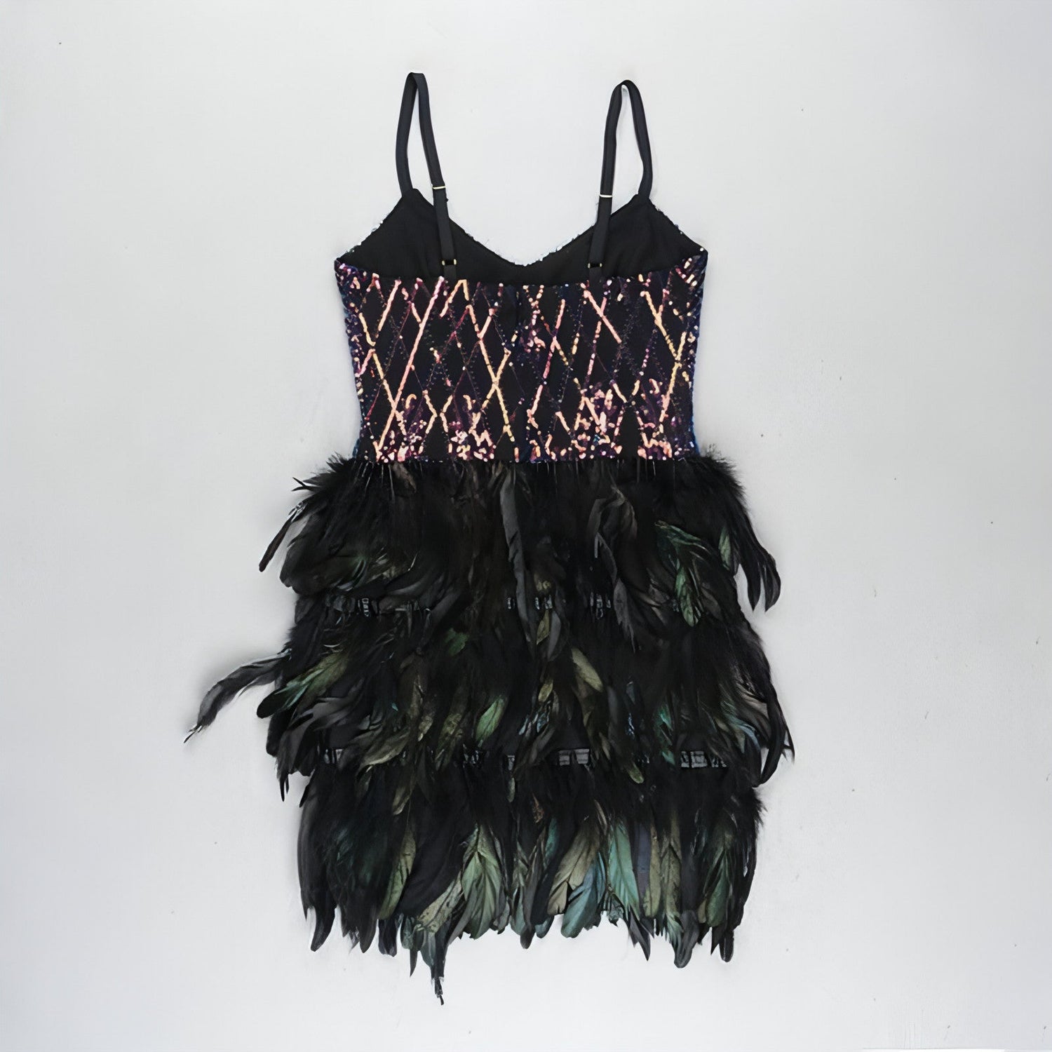 Carmine Juneberry sleeveless sequins dress with a fitted skirt and stylish suspenders, featuring tight sequin detailing.