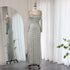 Carmine Juneberry long sleeve slim fishtail dress featuring a fitted silhouette and elegant design, shown in the image.
