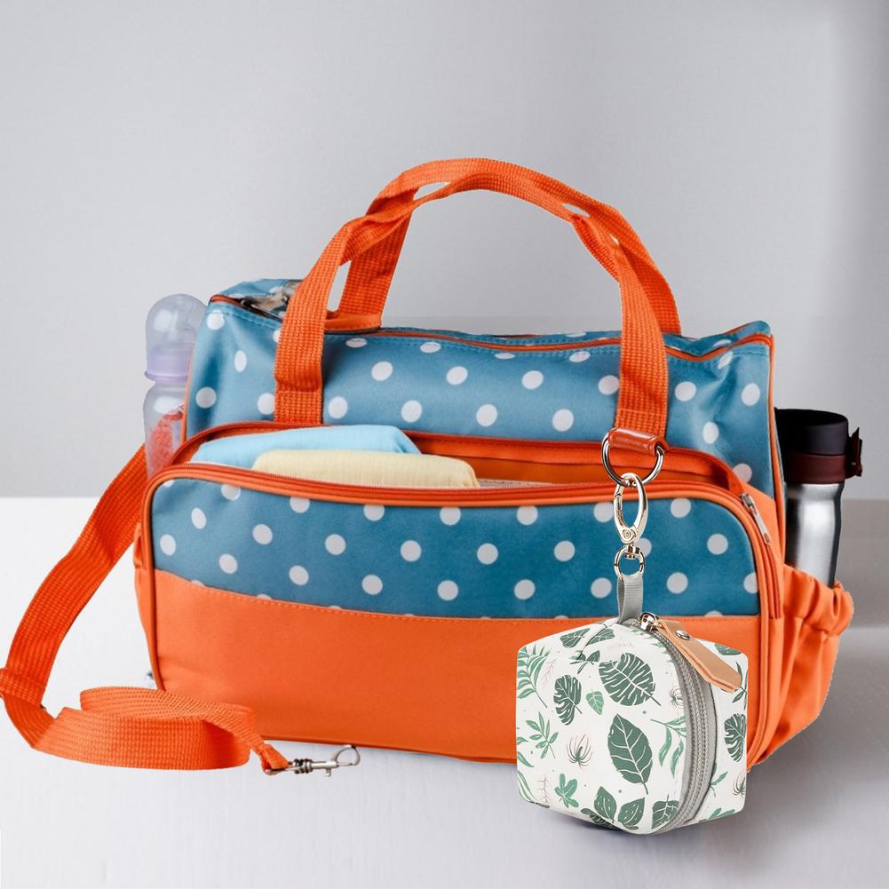 Maroon Asteria baby pacifier holder and impervious case for infants, with a compact design for easy attachment and hygiene.