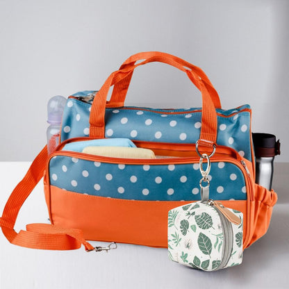 Maroon Asteria baby pacifier holder and impervious case for infants, with a compact design for easy attachment and hygiene.