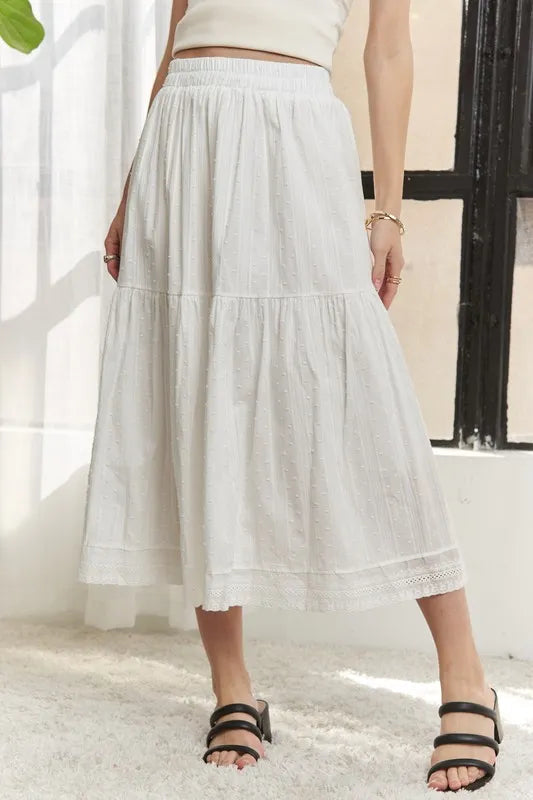 Jade Icarus ADORA elastic waistband tiered midi skirt in a stylish, flowing design with layered fabric for a chic look.