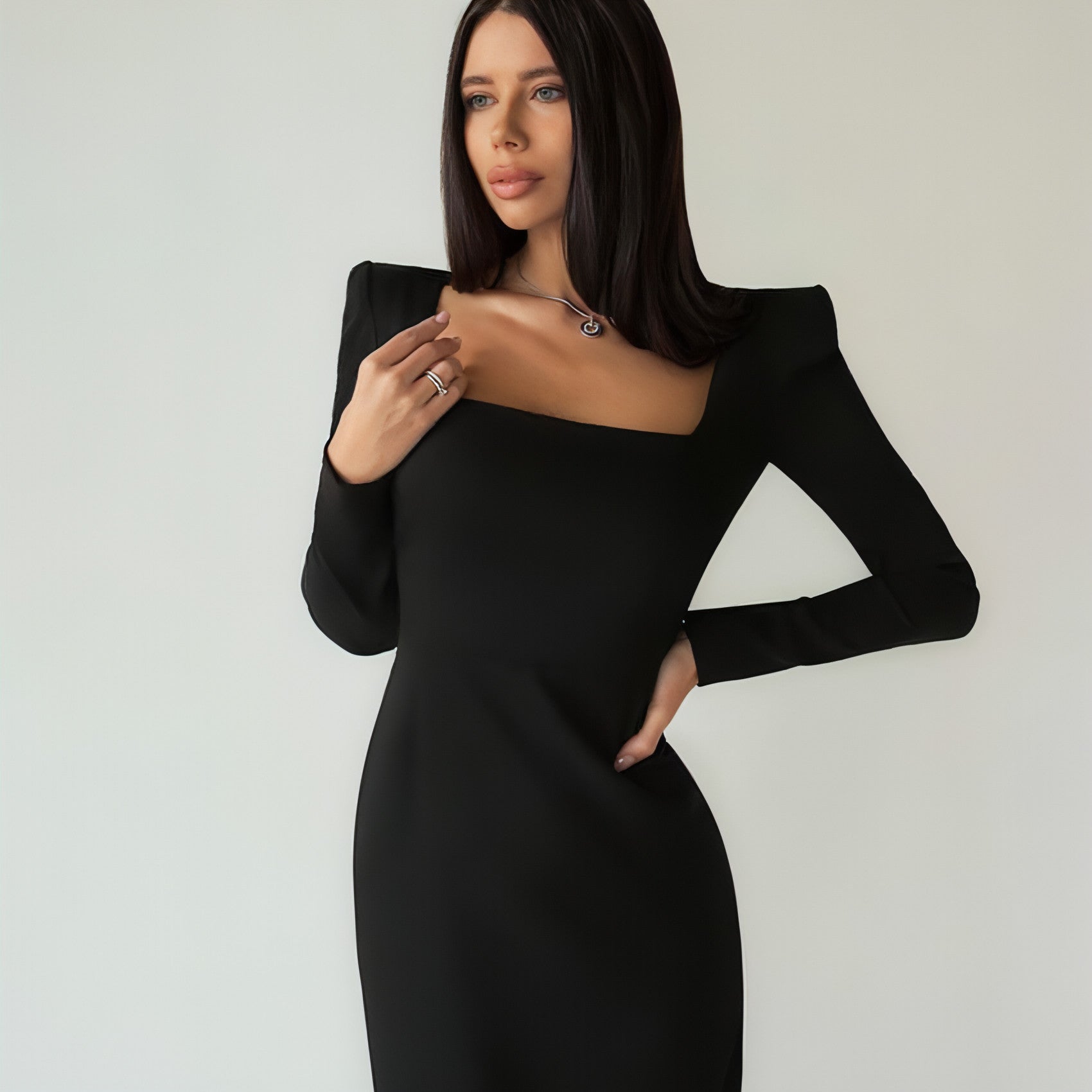 Carmine Juneberry long skirt with square neckline and slim fit, shown in a stylish, flowing design.